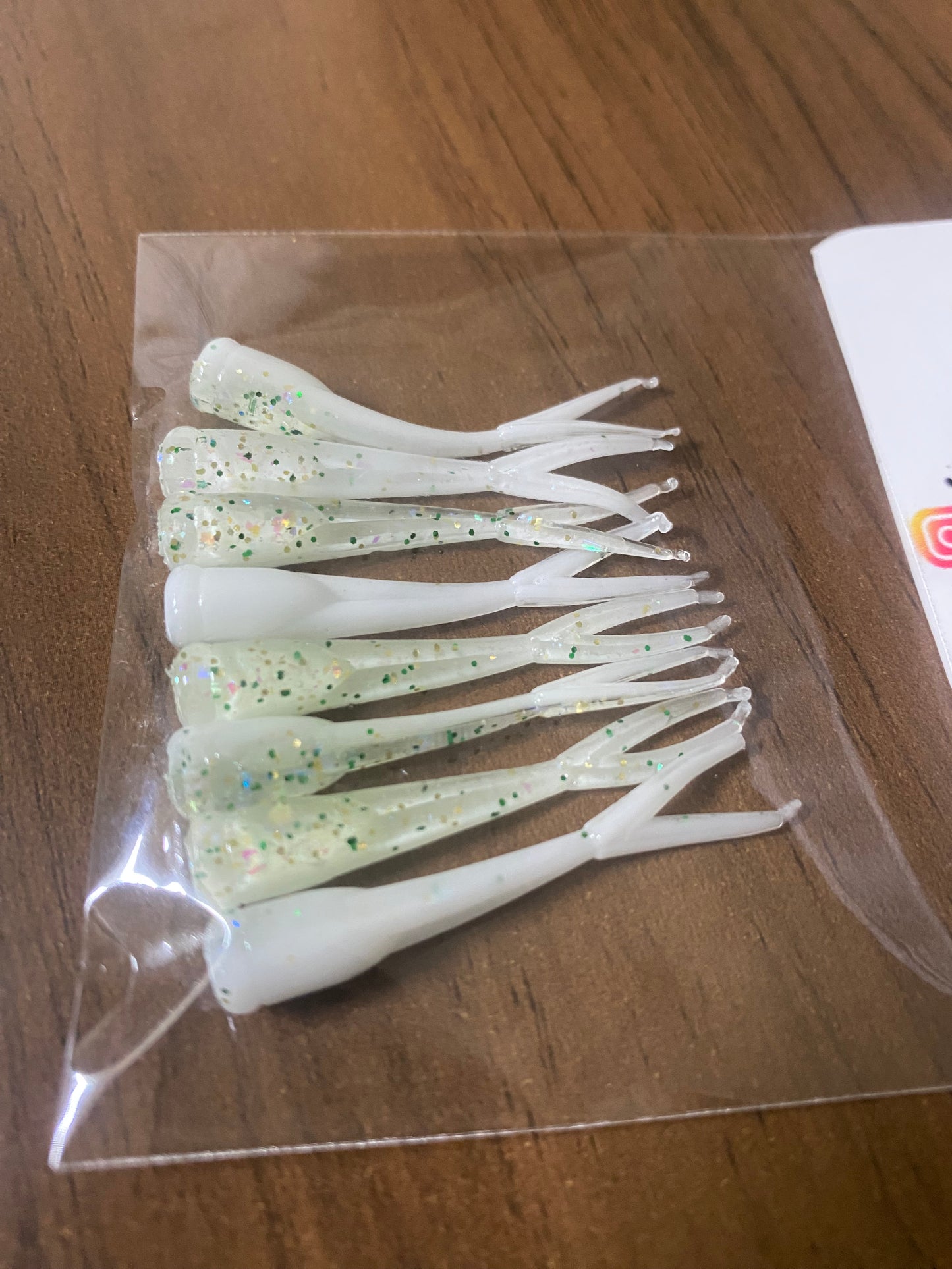 White/light green baby flukes